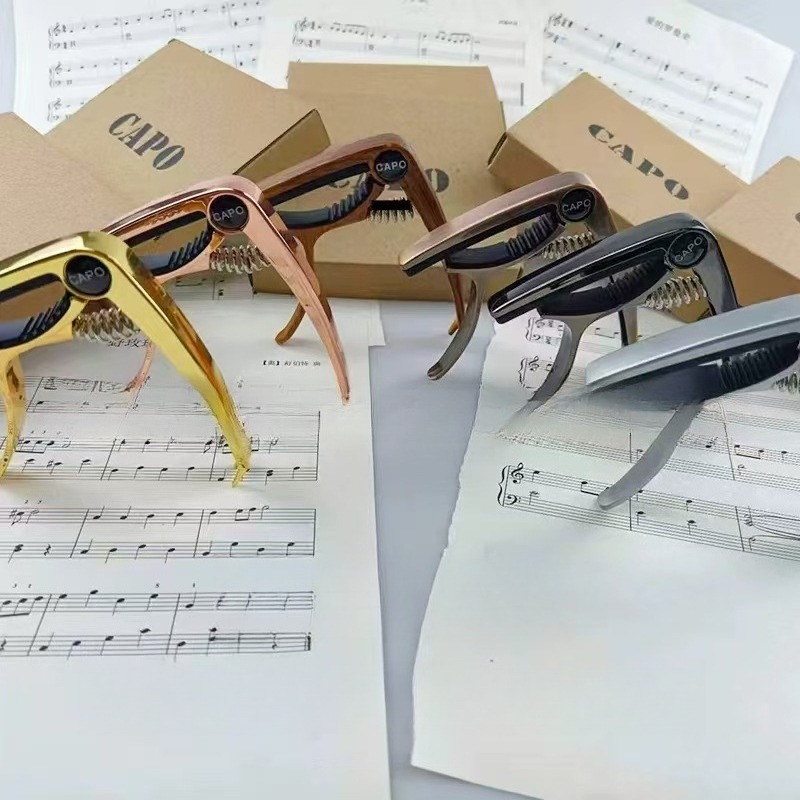 Capo para Guitarra de Metal, C - Musical Instrument Ending In A avaliação e preço
